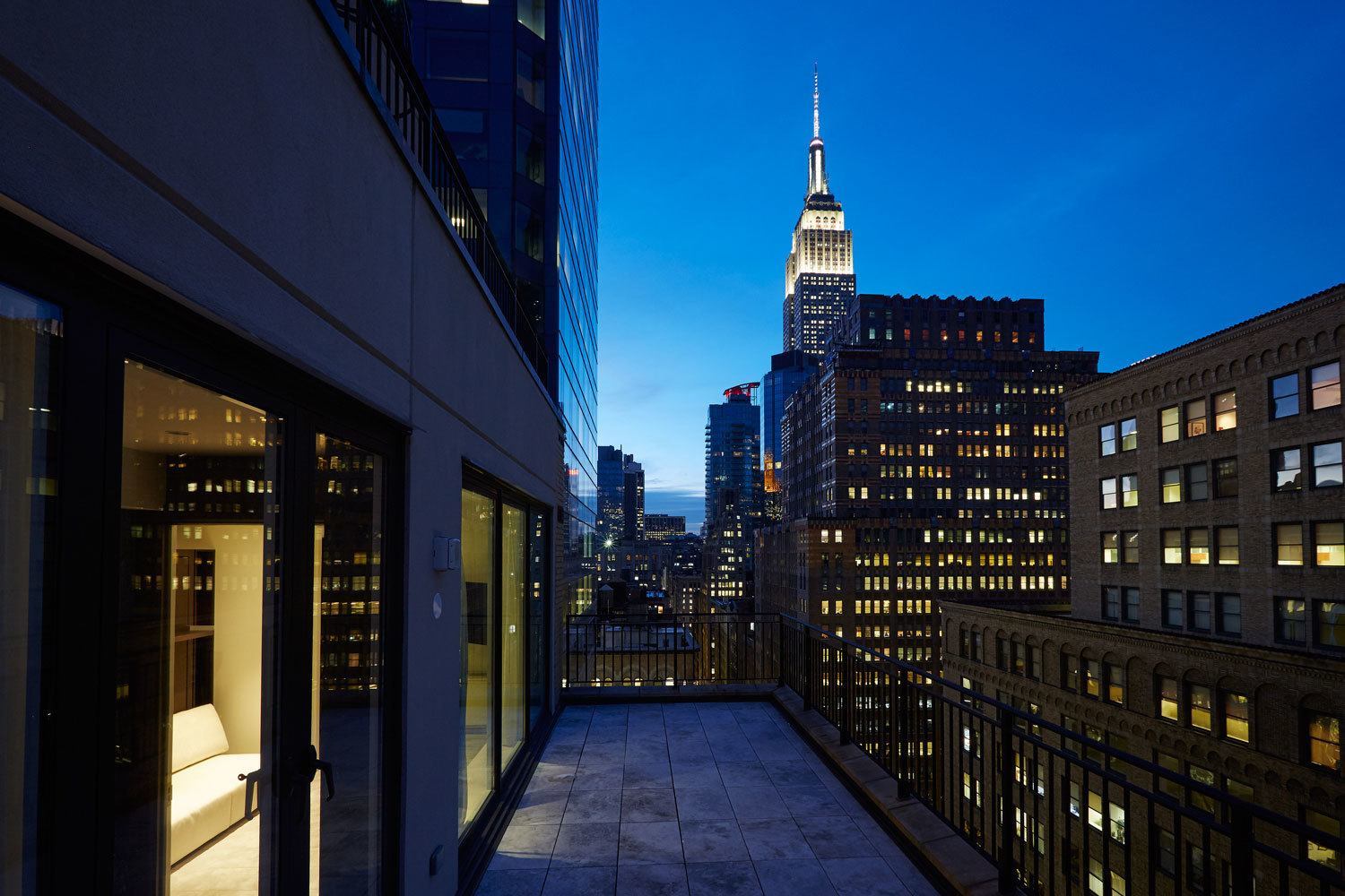 three-bedroom-duplex-penthouse-balcony-empire-state-building-view-night-shot-marmara-park-avenue 